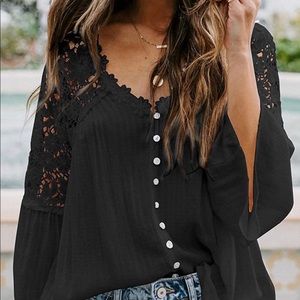 Women’s size medium black crochet blouse